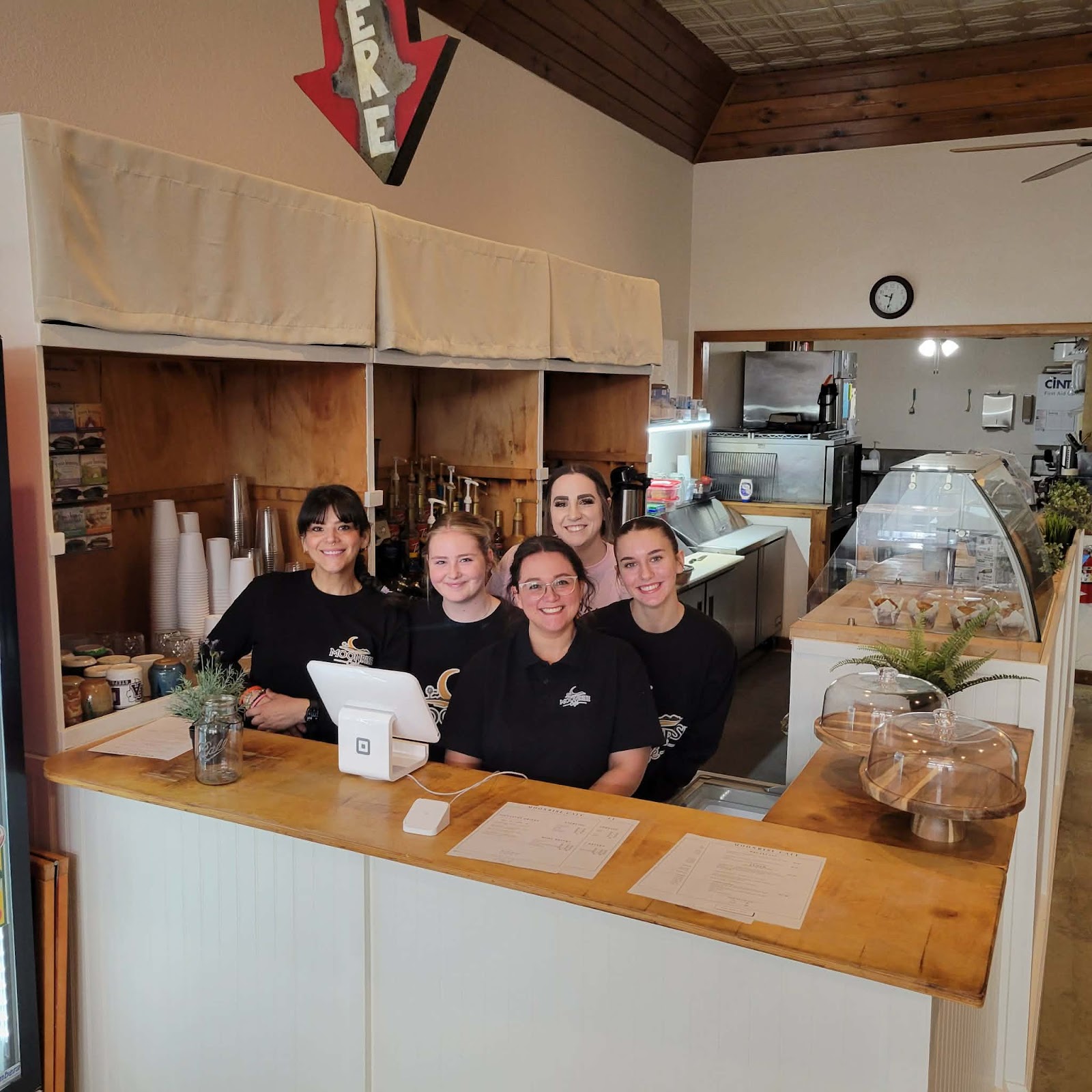 The friendly Moonrise Cafe team behind the counter in Luling, Texas